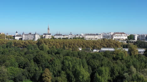aerial-view-from-a-park-with-trees-discovering-Pau-France-sunny-day